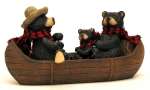 Bears sitting in Canoe