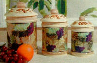 A Tuscan Grape ceramic canisters A Tuscan Grape ceramic canisters